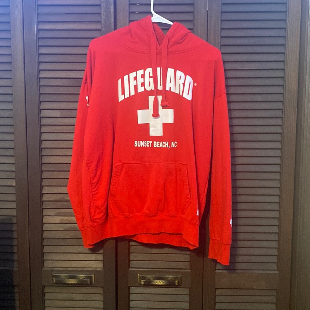 A large red lifeguard hoodie, it’s a nice thick hoodie, it just doesn’t fit me.